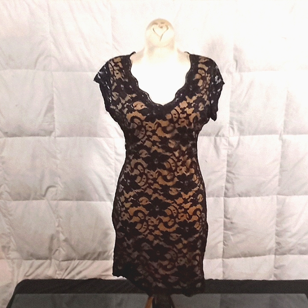 Low cut sleeveless mini by Liberty Love